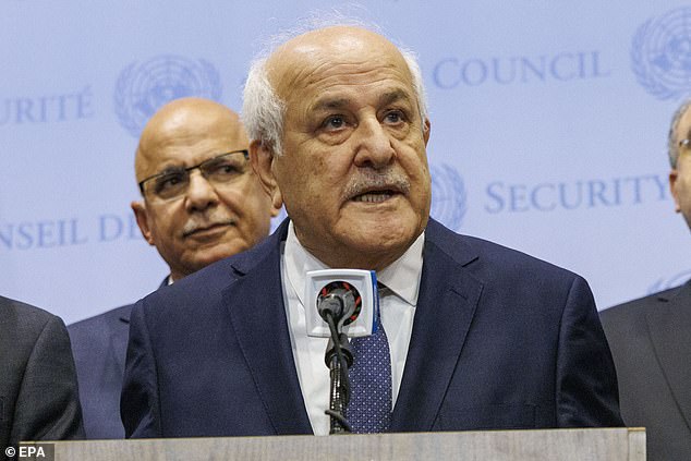 Ambassador of Palestine Riyad Mansour speaks at a press conference with representatives of other Arab countries after the vote