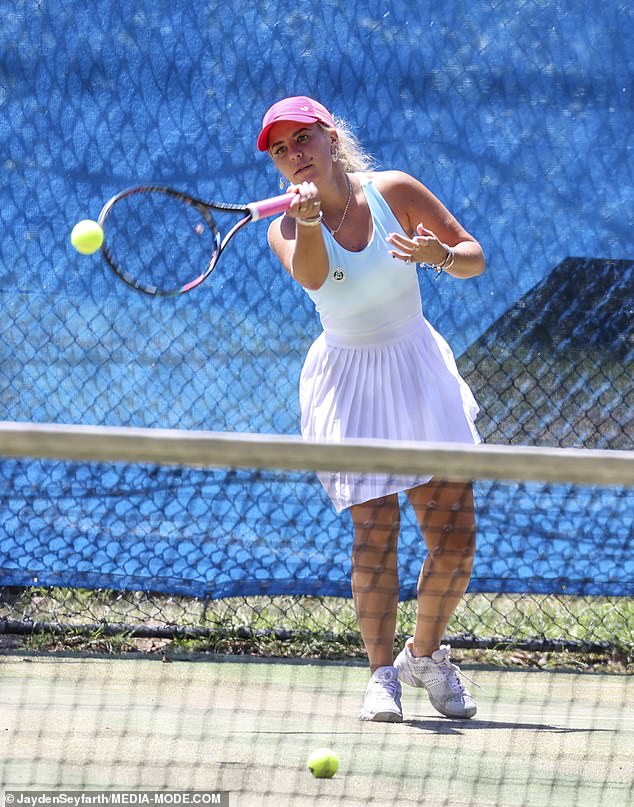 Silvia wore a little white skirt, light blue shirt and pink cap as she joined the cricketer on the field