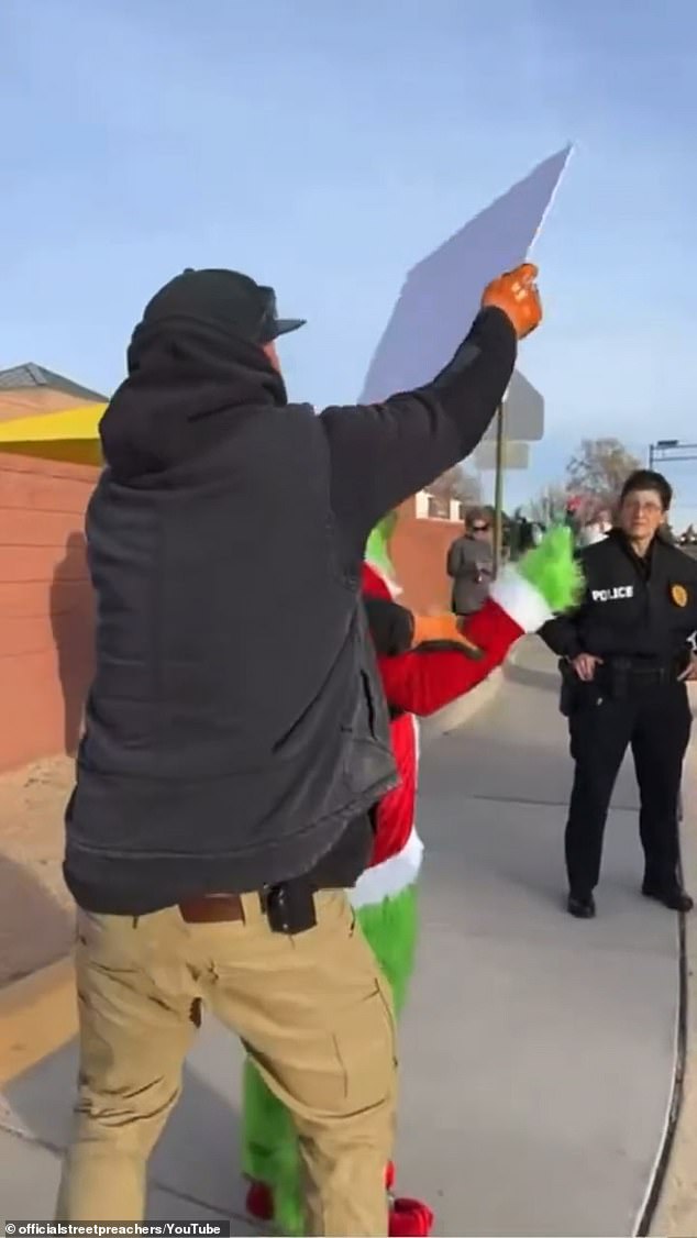 His actions upset parents at the school, who accused him of ruining Christmas.  He was confronted by an angry person who took away his plate and tore it up.