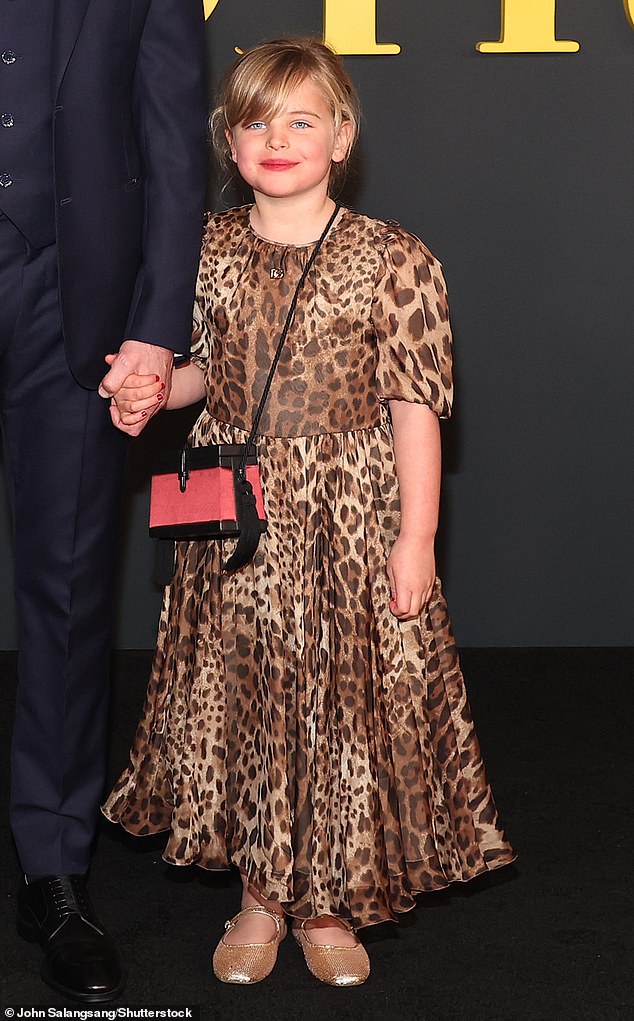 Lea looked adorable in a leopard print dress paired with sparkling gold ballet flats