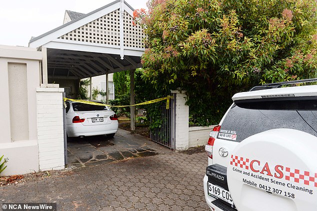 Crime scene tapes and forensic cleaners were seen at the Yungs' home on Wednesday