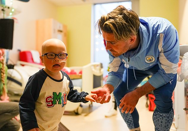 Jack Grealish was also on hand to visit patients as part of City's 'Greatest Season of All' Christmas campaign