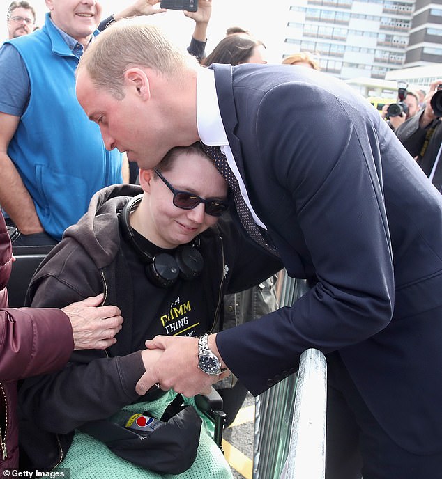 Prince William hugs Katie Daley during a visit to Aintree University Hospital in Liverpool in September 2017