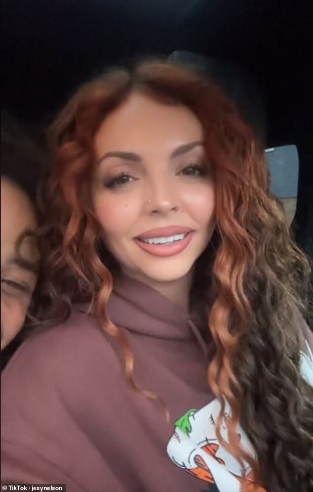 The singer and the musician crawled into a car together as Jesy announced: 