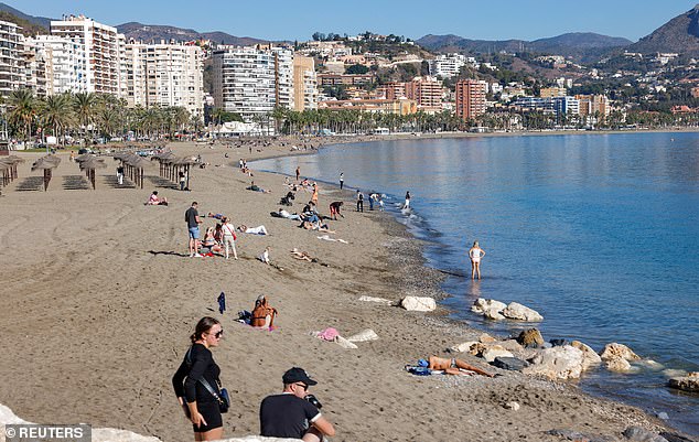 Tourists at Malagueta Beach in Malaga enjoyed Spain's likely last heat wave of 2023