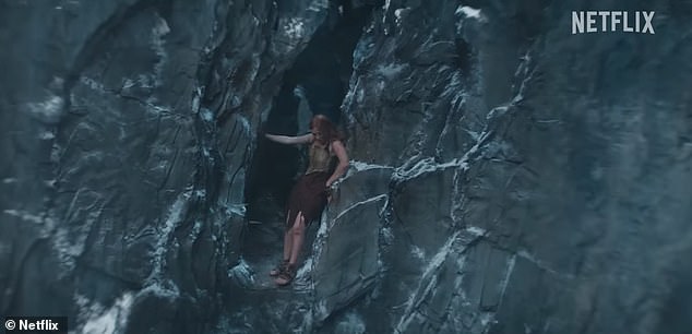 She is later seen tearing pieces of fabric from her dress as she climbs into a treacherous cave, only to find an opening hundreds of feet above the earth.