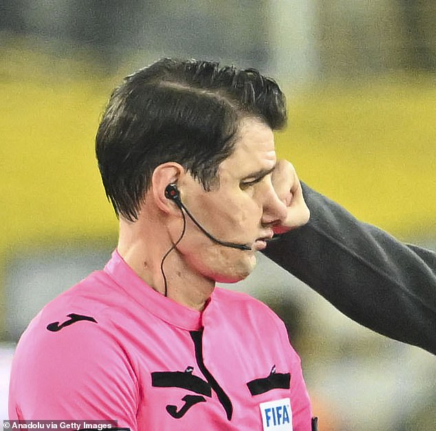 The moment when the fist of Faruk Koca, chairman of MKE Ankaragucu, makes contact with the face of referee Halil Umut Meler after a Turkish Super Lig match on Monday evening