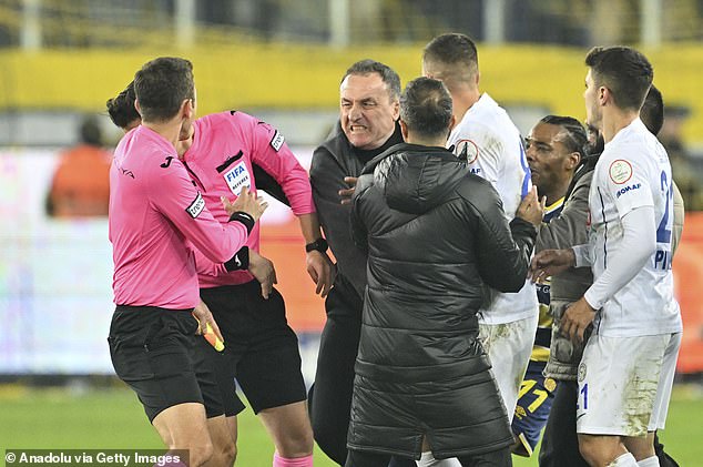 The match official was sent to the ground after the blow and suffered a black eye