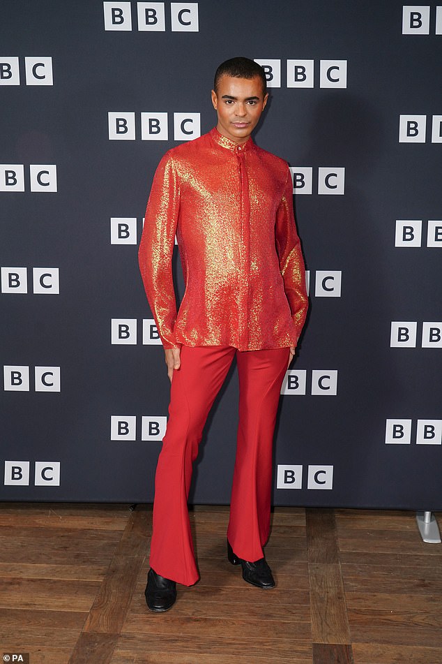 The Strictly sensation, 29, oozed glamor as he donned a red sparkly shirt and matching red flared trousers