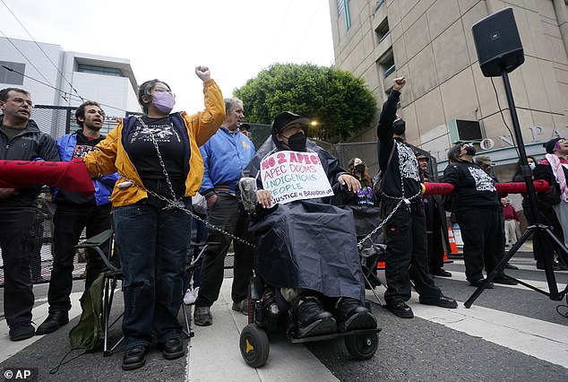 The protesters chanted: 'Biden, Biden tells lies, you don't care if the planet dies'