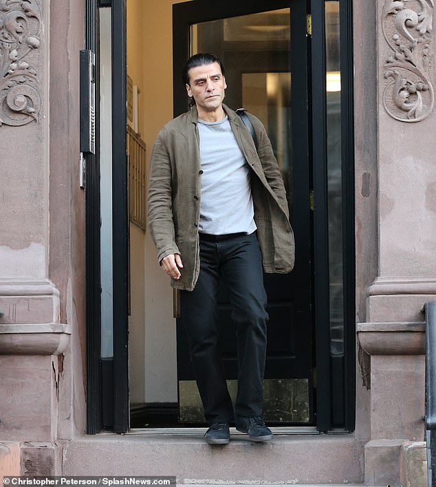 Isaac, who plays Poe Dameron in the Star Wars universe, was seen emerging from a brownstone building as cameras rolled over the film