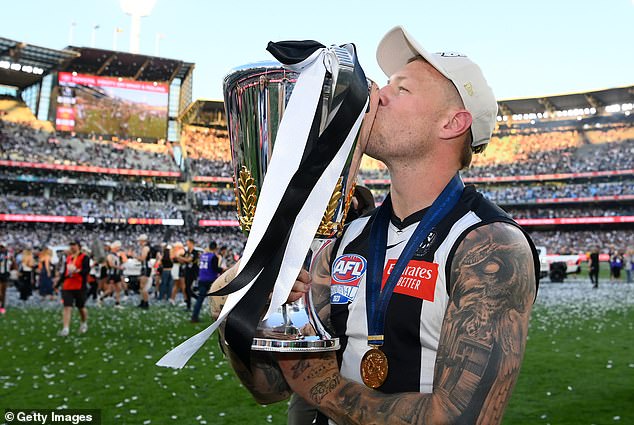 The 27-year-old said it 'means the world to me to have her here' as Elisabeth watched him help the Magpies capture their 16th flag (pictured)