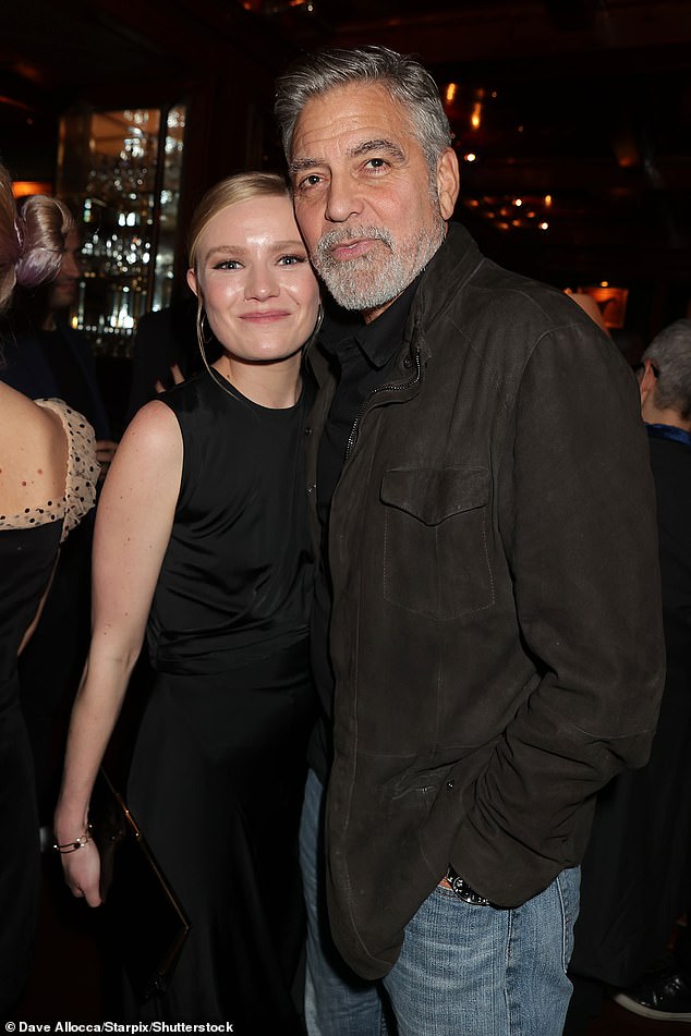 Clooney and Robinson posed for several photos during the late night party