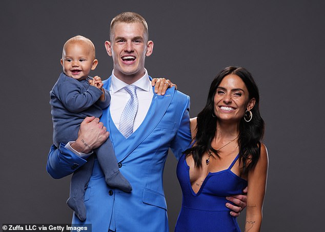 Garry (pictured with his wife Layla and son Leo) was one of the fighters of great importance on the UFC 296 card, but the illness prevents him from competing