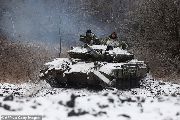 Two years after his offensive, Putin may sense that his fortunes in Ukraine are reviving, and that the balance could be tipping in Russia's favor.  In photo: Ukrainian soldiers drive a tank in a position near the city of Bakhmut, Donetsk region, on December 13, 2023