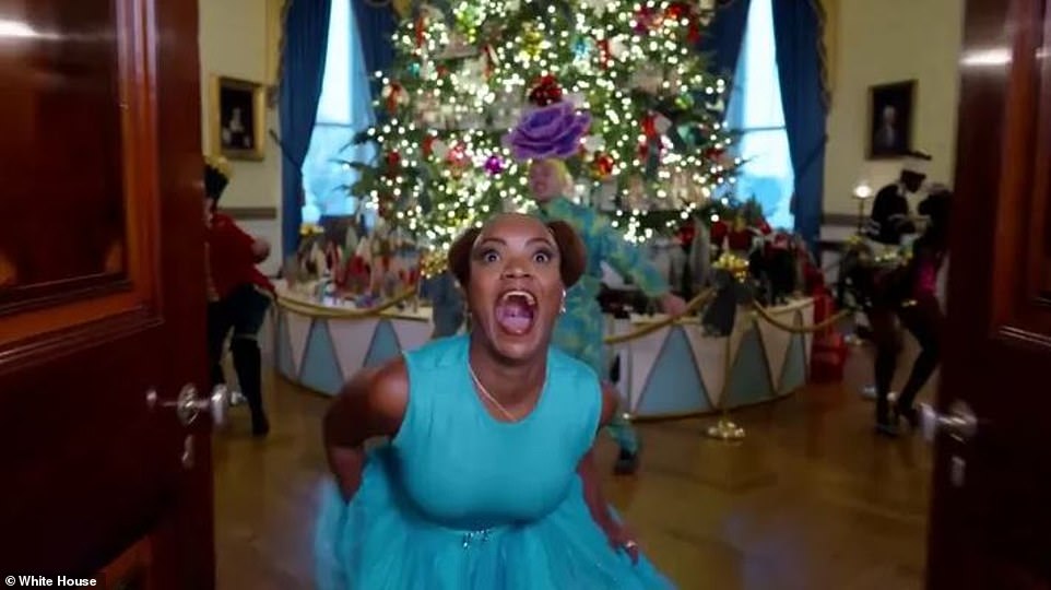 The dancers lead the viewer on a tour through the hallways of the White House and show how different rooms are decorated for the holidays