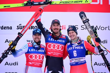 Bryce Bennett poses with Norway's Aleksander Aamodt Kilde and Switzerland's Marco Odermatt on the podium after Thursday's race.
