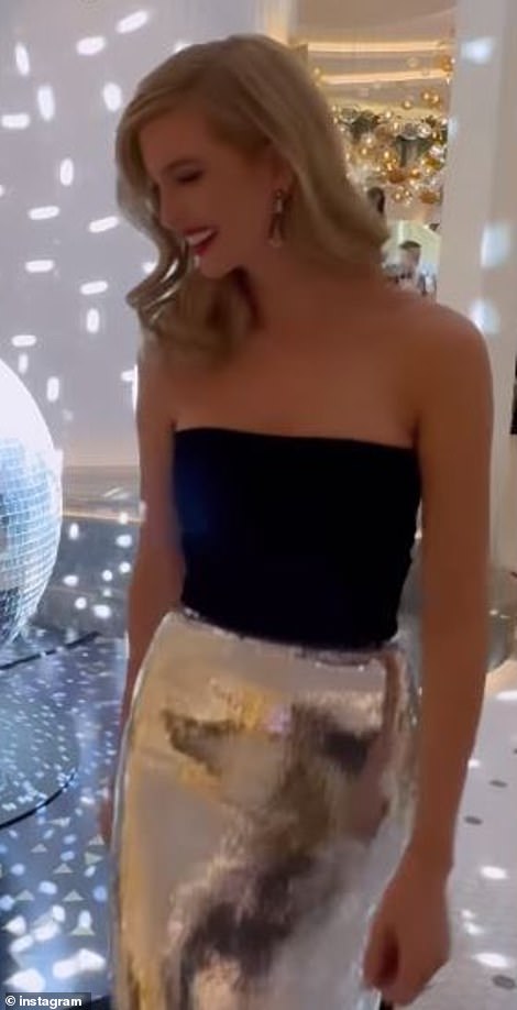 The socialite shared a clip standing next to an oversized disco ball before giggling and walking back to the camera