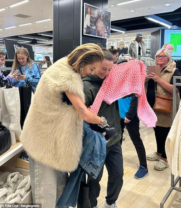 A video and photo was also posted of her checking out the RitaOra x Primark collection and hugging a fan who looked emotional when she saw her in store