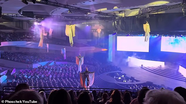 The Vegas-style spectacle featured nearly 1,000 performers and flying angels