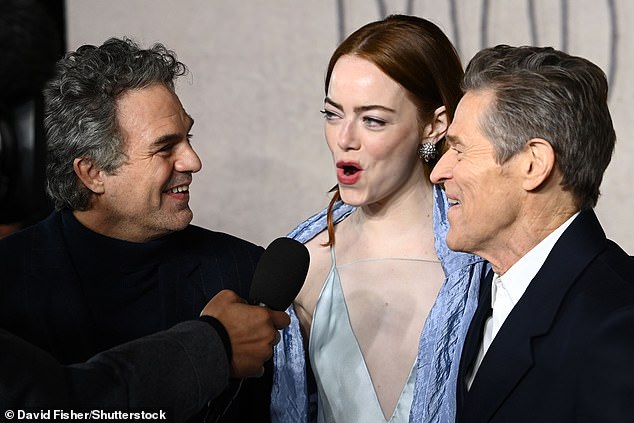 The trio were in good spirits as they were interviewed on the red carpet