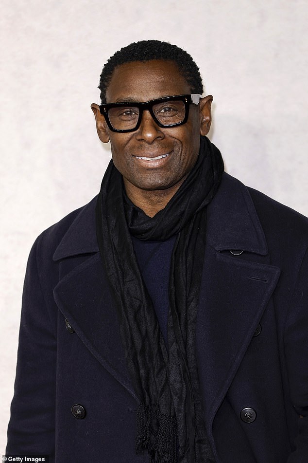 David Harewood, wearing a double-breasted winter coat