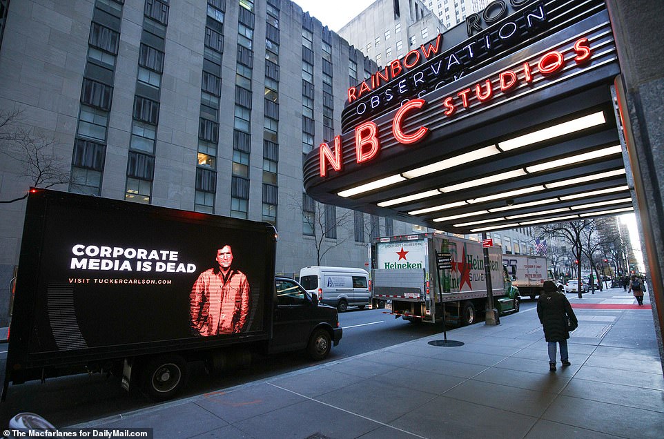 The former Fox News host had trucks with signs reading 