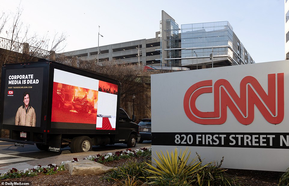 Before his time at Fox, Carlson expressed his conservative opinions on CNN shows.  His mobile billboard was seen outside the CNN offices today