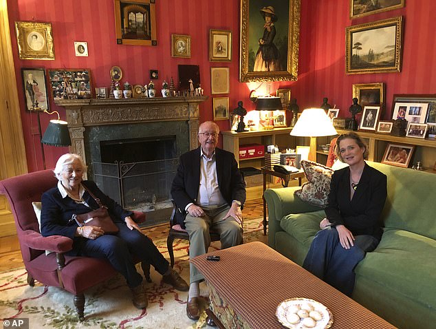 Delphine, right, meets her biological father King Albert II, center, and Queen Paola, left, during an informal meeting in Brussels 2020