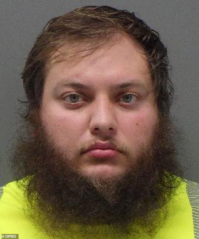 Justin Cowart, 26, was one of the husbands the woman was allegedly forced to have sex with.  He was charged with first-degree rape and aggravated battery