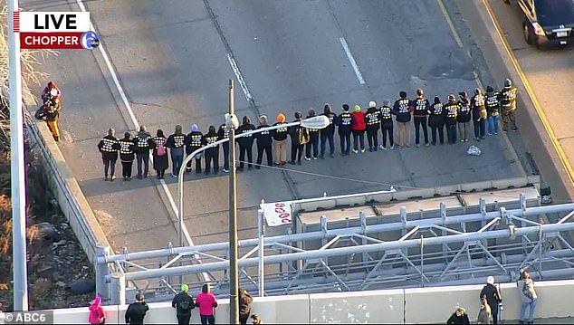 The group is seen lined up Thursday as they blocked I-76 at the Schuylkill Expressway in Center City