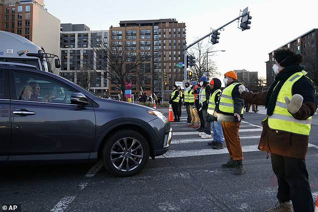 The demonstrators in Washington blocked cars on the road