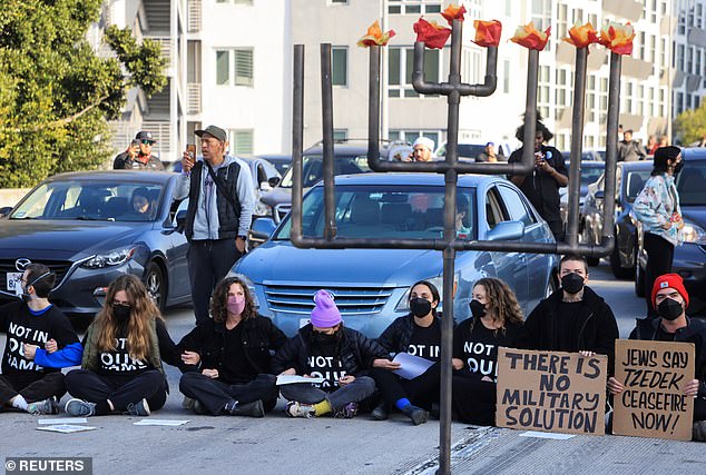 Protesters calling for an end to the ongoing war between Israel and Hamas, bringing traffic to a standstill on Interstate 110 Wednesday morning