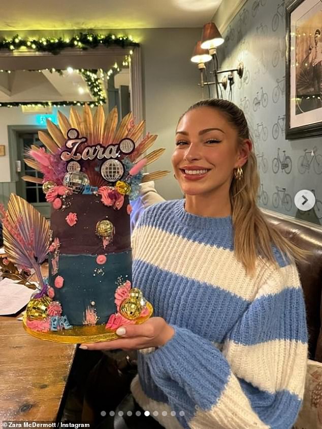 Elsewhere, Zara posed for a beaming photo with her Strictly Come Dancing themed cake