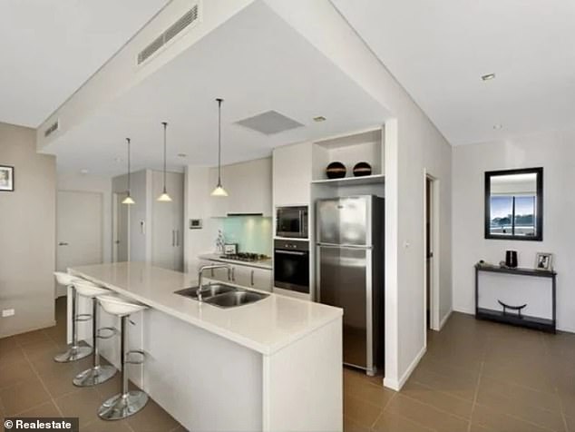 A modern kitchen including island is part of the open plan property purchased by the Chappells