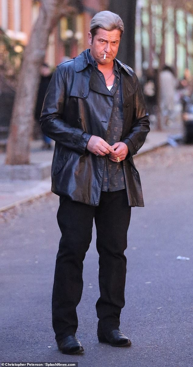 The resident of Paisley, Renfrewshire, Scotland showed off his evil look as he tried to light a cigarette while on the set of In The Hand Of Dante