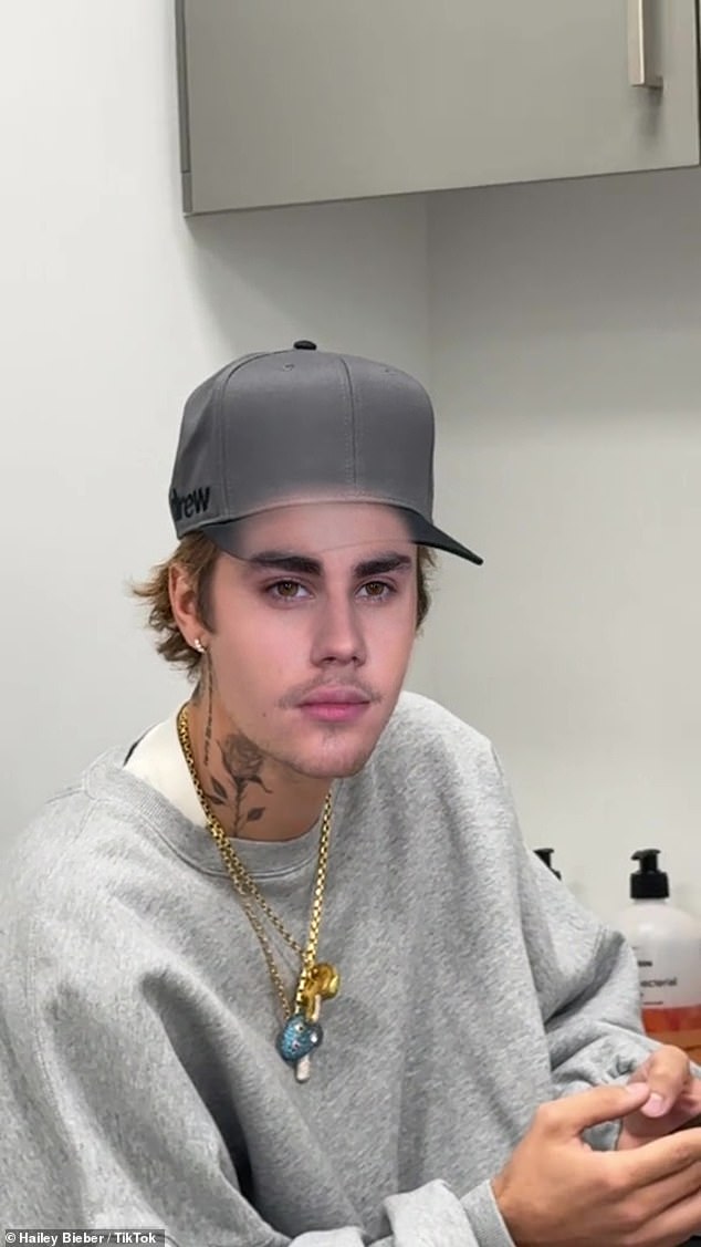 Bieber sat in a room on his phone while his wife filmed him