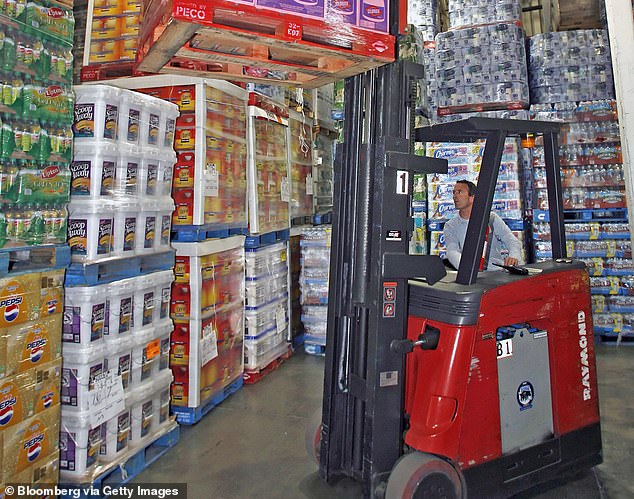 A man operates a forklift at a Costco warehouse in San Diego, California, in July 2007. When Vachris operated a forklift at a Price Club warehouse in Arizona in 1982, he would have been 18 years old.