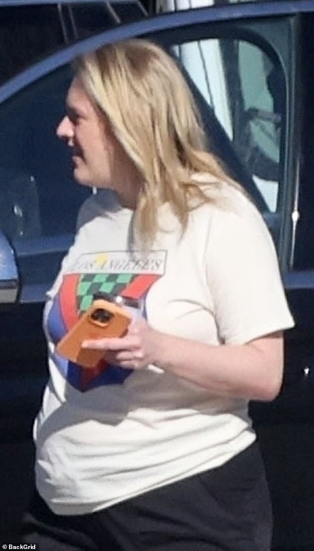 The 41-year-old star of The Handmaid's Tale was photographed wearing a white 'Los Angeles' T-shirt and baggy black sweatpants as she took a break from shooting a new project