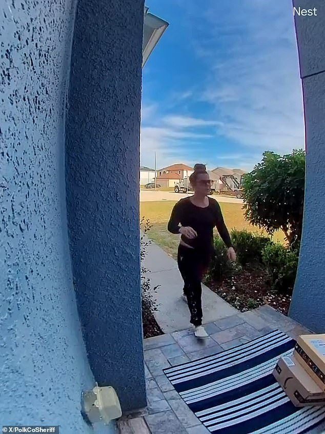 The victim's surveillance video shows the suspect walking straight to the porch and stealing numerous Amazon boxes before driving away in a red truck