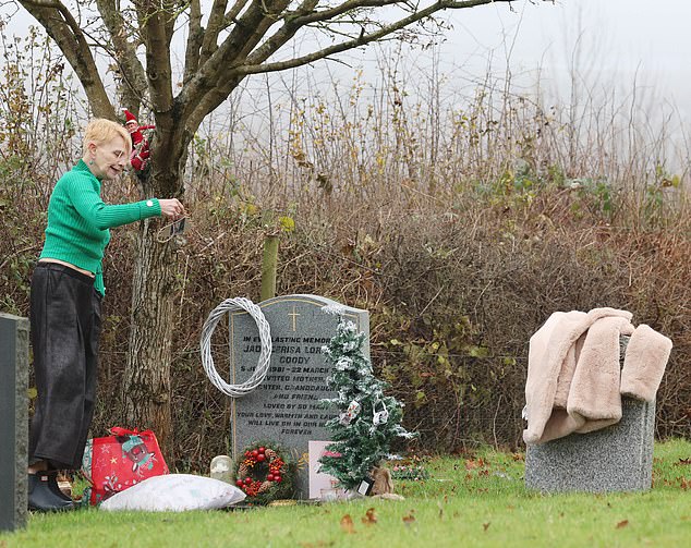 She placed the Christmas decorations on the headstone at the Essex Cemetery