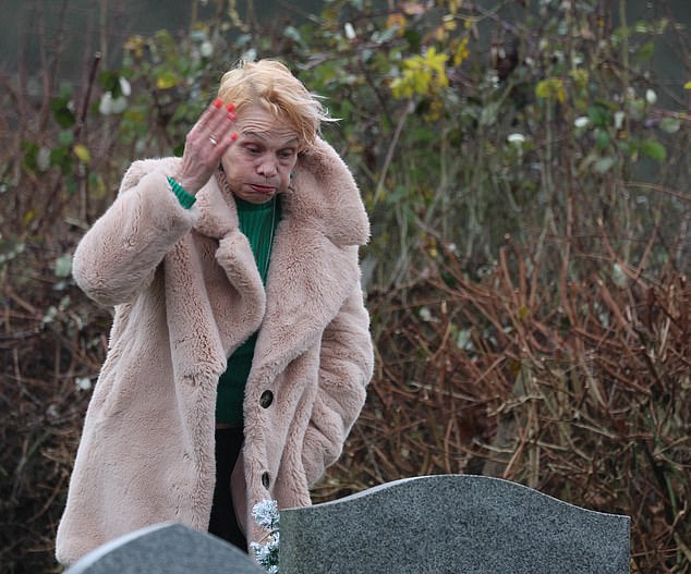 Jackiey appeared emotional at the graveside as she visited her daughter