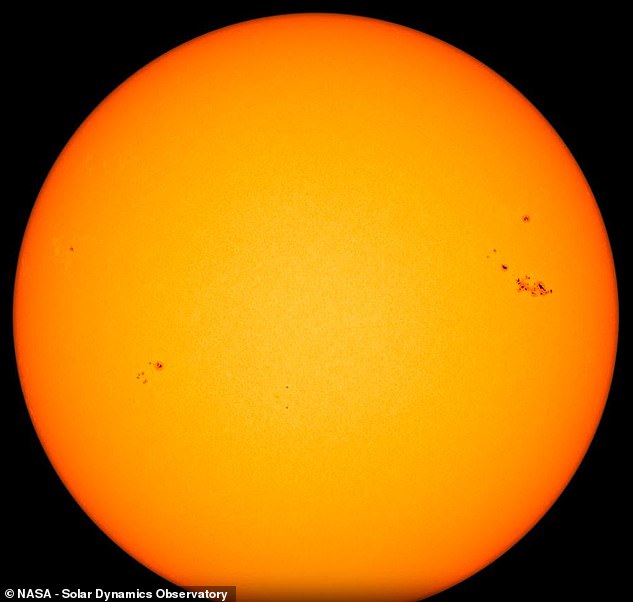 The solar flare that briefly disrupted radio communications yesterday was fired from a Sunspot called AR 3514 that appears as dark areas at upper right.