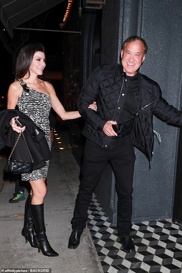 The Real Housewives of Orange County cast member looked like a supermodel in her black and white mini dress and black leather knee-high boots during a trip to Craig's in West Hollywood