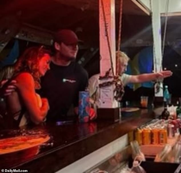 An unsuspecting Robert, 38, was chatted up with a mysterious blonde on July 16 at local bar Grabbers in the Bahamas, where his wife's new bartender, Terrance Bethel, 28, worked.