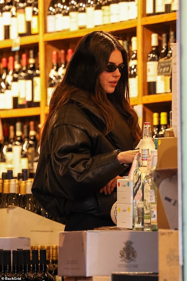 Jenner, the maker of 818 Tequila, stopped by a liquor store at one point