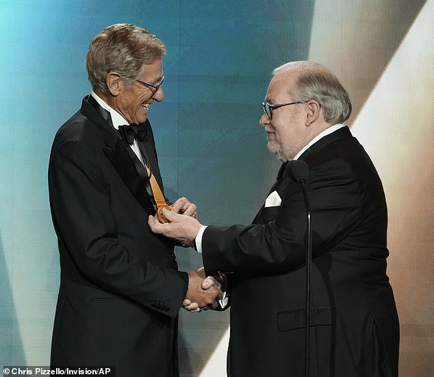 President of the National Academy of Television Arts and Sciences Terry O'Reilly helped welcome Povich to the 50th Daytime Emmy Awards ceremony