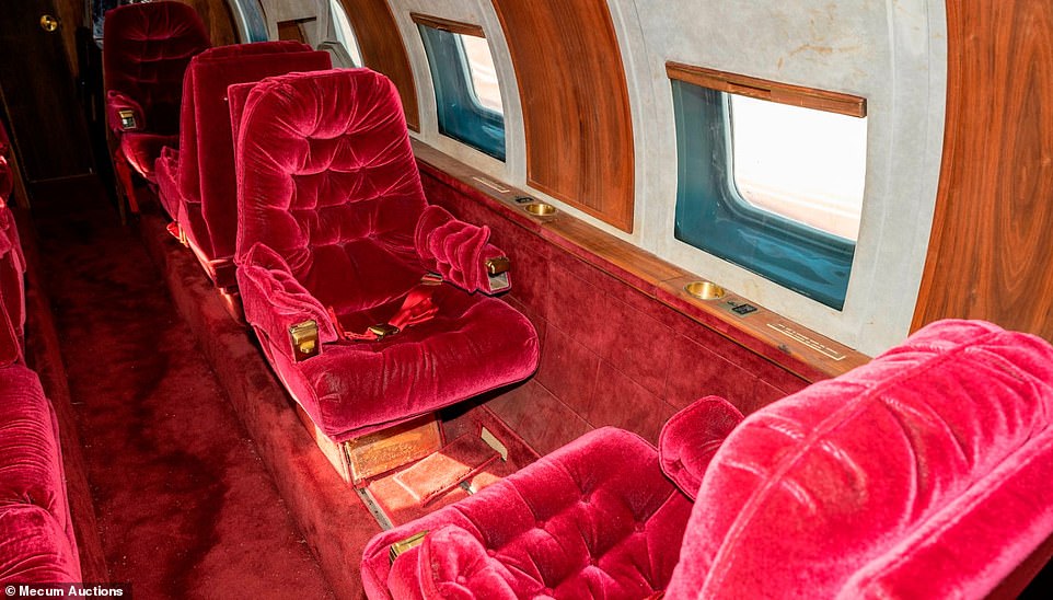 The cockpit, along with the rest of the aircraft, has never been restored.  The inside of the plane is filled with red velvet seats and carpet