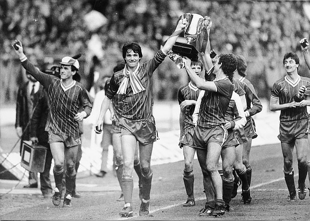 Kenny Dalglish, Alan Hansen, Ronnie Whelan, Graeme Souness and Ian Rush celebrate a 2-1 win over Manchester United in the Milk Cup final at Wembley in 1983