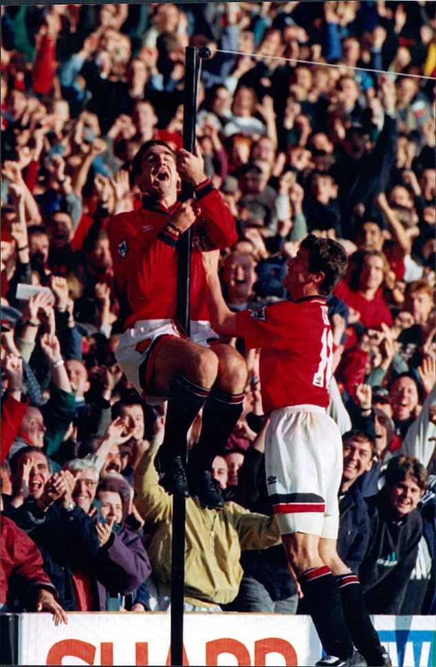 Eric Cantona shows his joy after scoring in his first match after a nine-month ban for kicking a fan